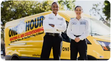 Two One Hour AC Techs in front of a yellow One Hour Air service van